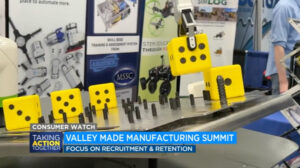 robot holding dice on the news